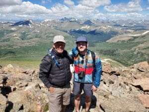 Photo of Billy Lyman and his dad at the top of Mt. Bierstadt. 